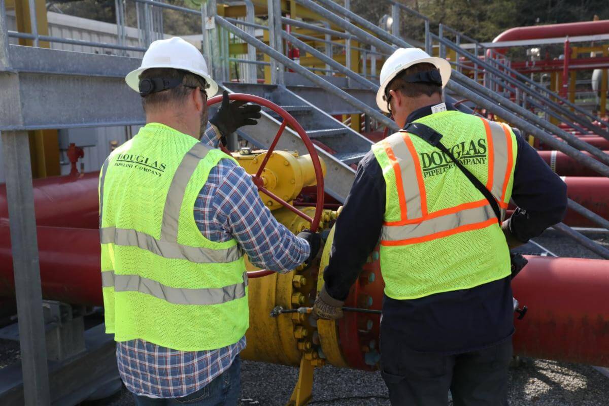 Douglas Pipeline employees working on natural gas pipeline